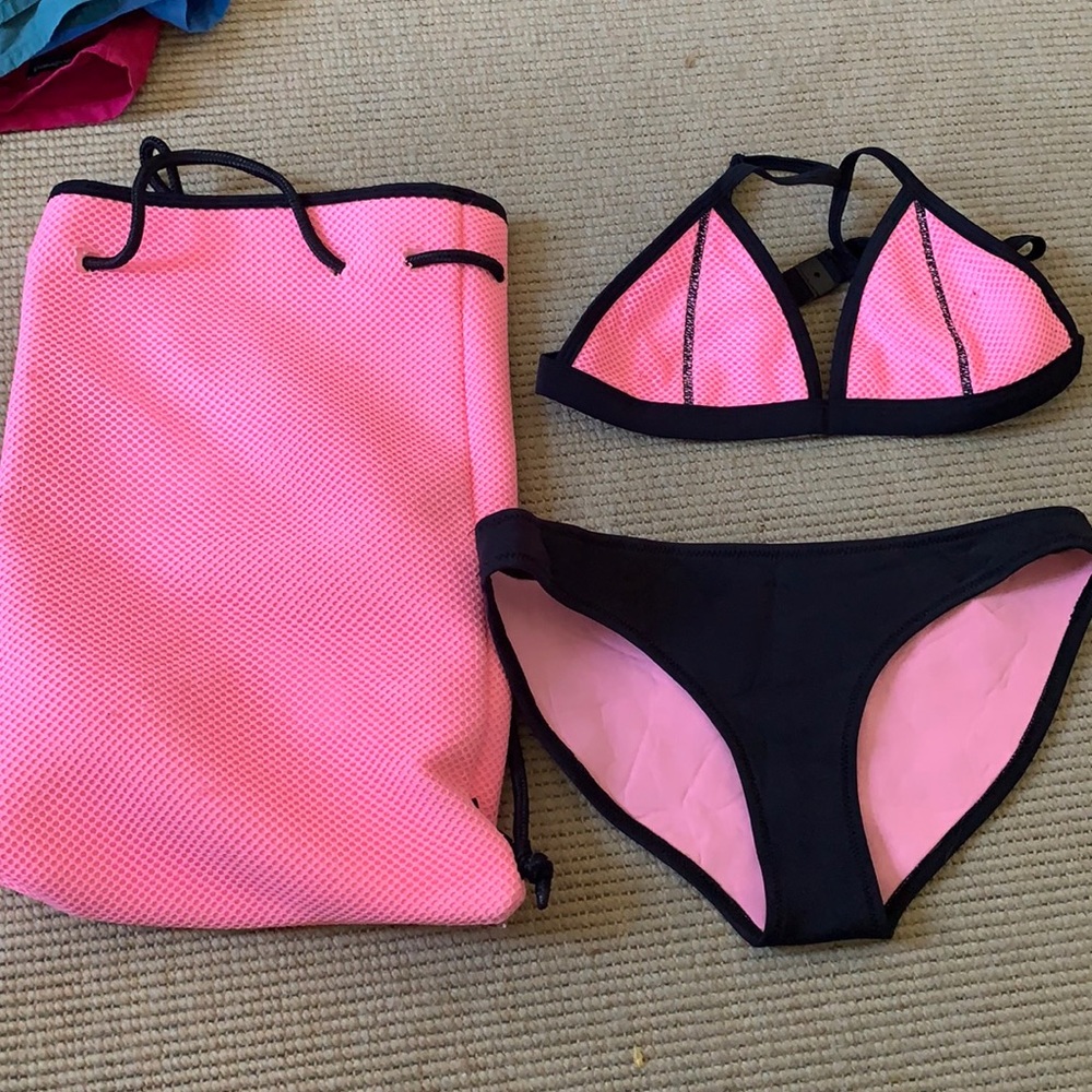 Triangle swimsuit with bag! Worn very little !